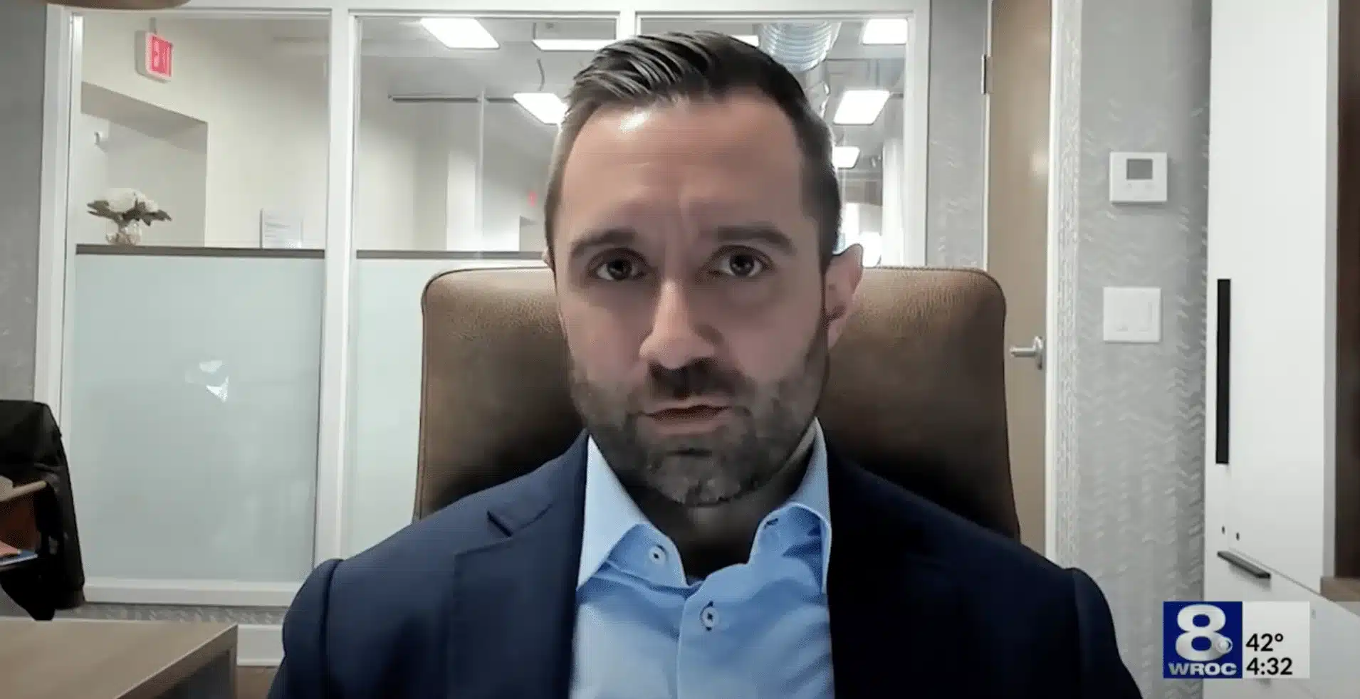 John Richmond of Richmond Vona, LLC appears in a televised interview on WROC News, discussing legal insights for property owners